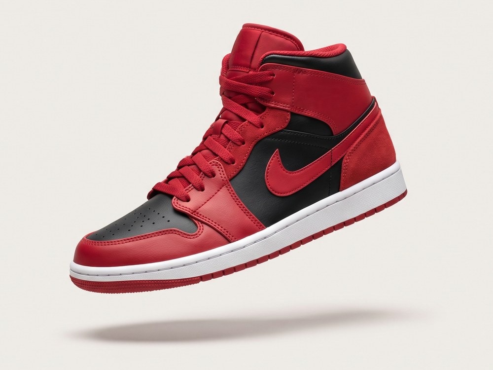 Red, black and white high-top basketball sneaker